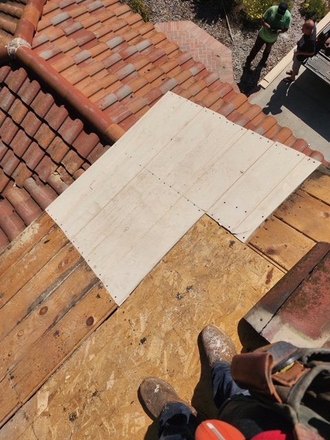 Slide of MMM Roofing