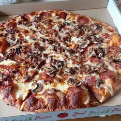 Kayak Pizza & Subs - Pepperoni, sausage, mushroom with extra cheese. Pipping hot and great!