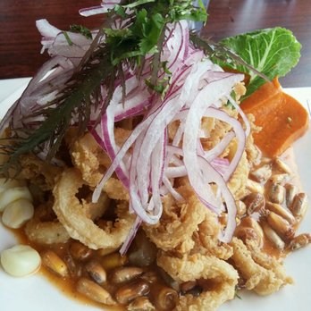 Chio's Peruvian Grill - Ceviche with calamari with le tigre citrus sauce was outstanding! - Peruvian Near Me - Van Nuys, California Chio's Peruvian Grill - Ceviche with calamari with le tigre citrus sauce was outstanding! - Peruvian Near Me - Van Nuys, California