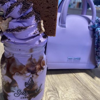 Surreal Creamery - Know Your Roots Mason Jar Special: taro ice cream, Cinnamon Toast Crunch, chocolate syrup, and a cinnamon graham cracker - Ice Cream & Frozen Yogurt Near Me - Westfield, New Jersey Surreal Creamery - Know Your Roots Mason Jar Special: taro ice cream, Cinnamon Toast Crunch, chocolate syrup, and a cinnamon graham cracker - Ice Cream & Frozen Yogurt Near Me - Westfield, New Jersey
