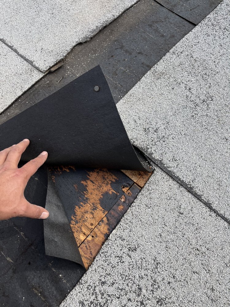 Slide of All out Roofing and Construction