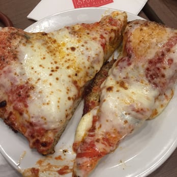 Spontini - The big pizza. If you want a normal size don't include the small slice. - Pizza Near Me - Milan, Michigan