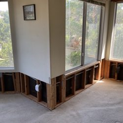 Boardwalk Contractors - Bedroom with damaged drywall removed.