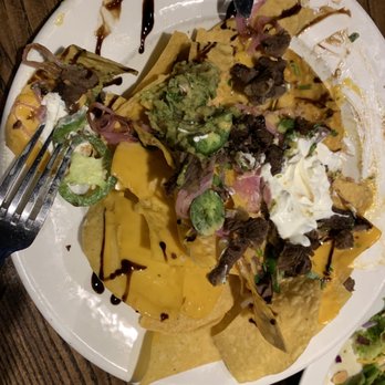 Local Goat - Steak nachos - New American Near Me - Pigeon Forge, Tennessee Local Goat - Steak nachos - New American Near Me - Pigeon Forge, Tennessee