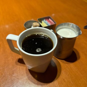 Ostra - Black coffee with cream and sugar - New American Near Me - San Antonio, Texas