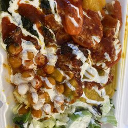John Soup & Grill - All the veggies.  Super hot sauce.  Spicy rice.  $5