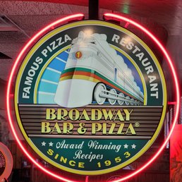a neon sign in a restaurant