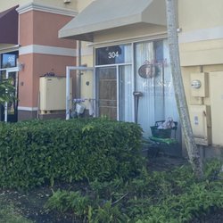 Golden Phoenix - Back of the restaurant has socks drying in the door.