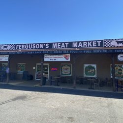 Ferguson's Meat Market - Exterior rustic with picnic tables for outside dining.