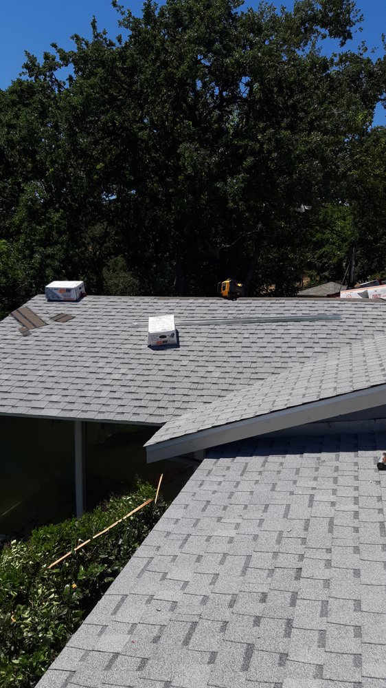 Slide of Mackney Roofing