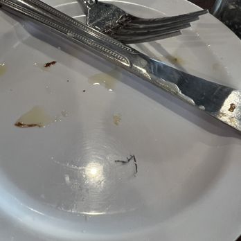 Toast - Piece of tin foil I got to chew on instead of scampi. - Pizza Near Me - Ocean City, Maryland