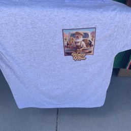 Picture of honey man's tee shirt out in front of store Picture of honey man's tee shirt out in front of store