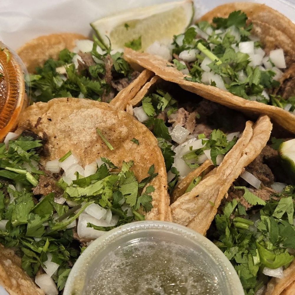 3 asada and 2 carnitas tacos. 3 asada and 2 carnitas tacos.