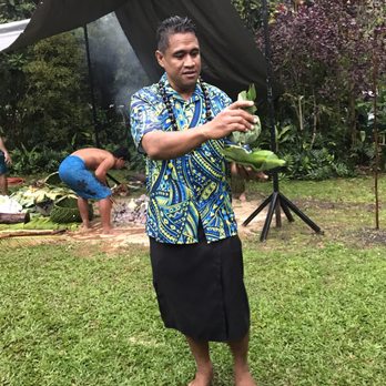 Toa Luau - Dennis telling us about the prep and cooking traditions...in the rain. - Cultural Center Near Me - Haleiwa, Hawaii Toa Luau - Dennis telling us about the prep and cooking traditions...in the rain. - Cultural Center Near Me - Haleiwa, Hawaii