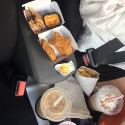 a tray of food in the back seat of a car