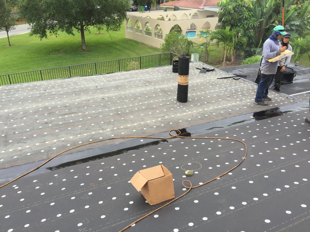 Slide of ABC Roofing Corp.