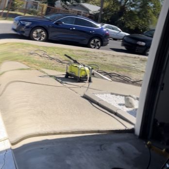 GCMmobileautospa - This is a reflection off of my wife's car, of the cars on the street. Looks like a black mirror. - Auto Detailing Near Me