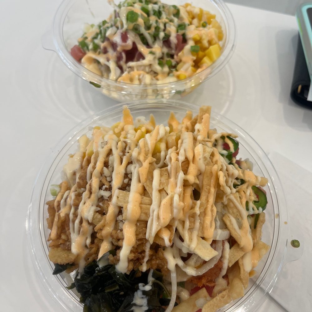 two bowls of food on a table two bowls of food on a table