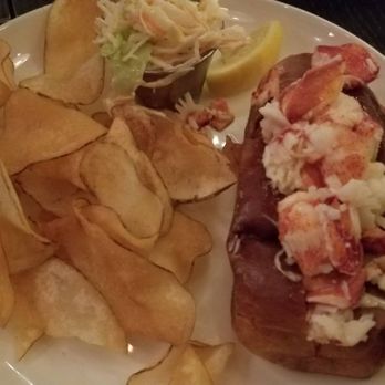 Row 34 - Seaport - Lobster roll with some chips. - New American Near Me - Boston, Massachusetts