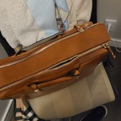 The Cobbler & The Tailor - Brought in my bag to have an issue w/the zipper teeth separating fixed - was told it was fixed, charged $35 - this happened one day later.