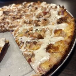 Funkadelic Chicken with garlic butter base and extra ranch drizzle