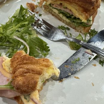 Monae Fusion Brunch Café - Breakfast croissant 1/2 eaten - Coffee & Tea Near Me - Glendale, Arizona Monae Fusion Brunch Café - Breakfast croissant 1/2 eaten - Coffee & Tea Near Me - Glendale, Arizona