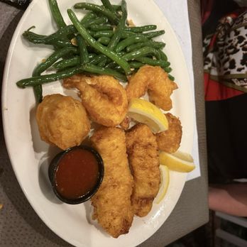 Diamond Jim's Steakhouse - Seafood platter, which has cod, scallops, and jumbo shrimp. - Steakhouses Near Me - Hales Corners, Wisconsin Diamond Jim's Steakhouse - Seafood platter, which has cod, scallops, and jumbo shrimp. - Steakhouses Near Me - Hales Corners, Wisconsin
