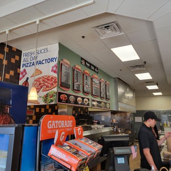 Pizza Factory - a man standing at the counter - Pizza Near Me - Plymouth, Massachusetts Pizza Factory - a man standing at the counter - Pizza Near Me - Plymouth, Massachusetts