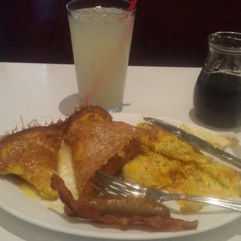 Cafe 50's - French toast, one slice of bacon and sausages with some cheese eggs! Fantastic! - Diners Near Me - Los Angeles, California