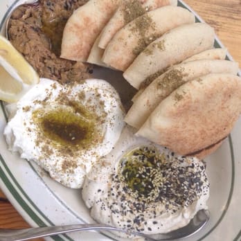 Fat Pasha - Three of the salatim options. Eggplant dip, yogurt based dip, and tahini based dip. - Middle Eastern Near Me - Toronto, Ontario