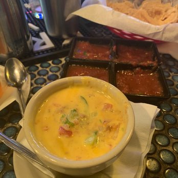Curra's Grill - Oltorf - Queso, salsa, and yummy chips, all a perfect start to a great dinner. - Mexican Near Me - Austin, Texas Curra's Grill - Oltorf - Queso, salsa, and yummy chips, all a perfect start to a great dinner. - Mexican Near Me - Austin, Texas