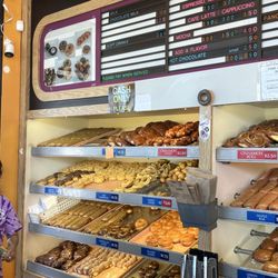 Pao's Donut & Coffee Shop - 8/21/25: Donut selection at 9:45am. Three versions of crullers! Menu pricing is super reasonable. Solid basic coffee drinks too.