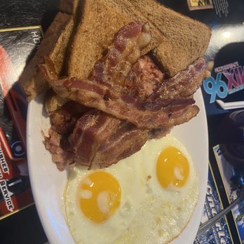The Log Cabin - bacon, eggs, and toast on a plate - American Near Me - Seneca, Pennsylvania
