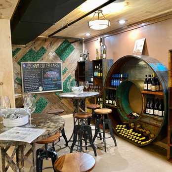 Ram Cat Cellars - Front tables and wine shelves - Whiskey Bars Near Me - Seneca, South Carolina