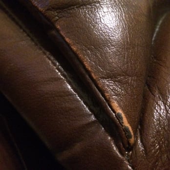 Ashley Store - Does this look like real leather to you? Salesman Mack repeatedly said, "The seating surfaces are leather." Well this is the seat pan: fake! - Furniture Stores Near Me - Bakersfield, California Ashley Store - Does this look like real leather to you? Salesman Mack repeatedly said, "The seating surfaces are leather." Well this is the seat pan: fake! - Furniture Stores Near Me - Bakersfield, California