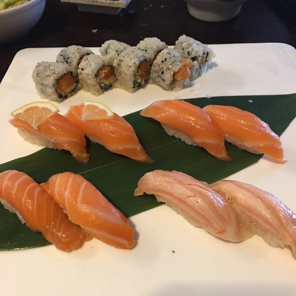 Umami - Salmon flight Two each of soy salmon, smoked salmon, citrus salmon, and one spicy salmon roll. - Japanese Near Me - Bellevue, Nebraska Umami - Salmon flight Two each of soy salmon, smoked salmon, citrus salmon, and one spicy salmon roll. - Japanese Near Me - Bellevue, Nebraska