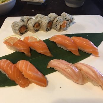Umami - Salmon flight Two each of soy salmon, smoked salmon, citrus salmon, and one spicy salmon roll. - Japanese Near Me - Bellevue, Nebraska Umami - Salmon flight Two each of soy salmon, smoked salmon, citrus salmon, and one spicy salmon roll. - Japanese Near Me - Bellevue, Nebraska