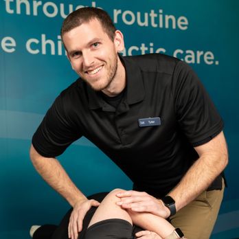 The Joint Chiropractic - Dr. Tyler adjusting his first patient, who was from La Pine, Oregon. - Chiropractors Near Me - Bend, Oregon The Joint Chiropractic - Dr. Tyler adjusting his first patient, who was from La Pine, Oregon. - Chiropractors Near Me - Bend, Oregon