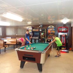 Skyline RV & Camping Resort - Young Campers enjoying a game of Pool in the Snack Stand!