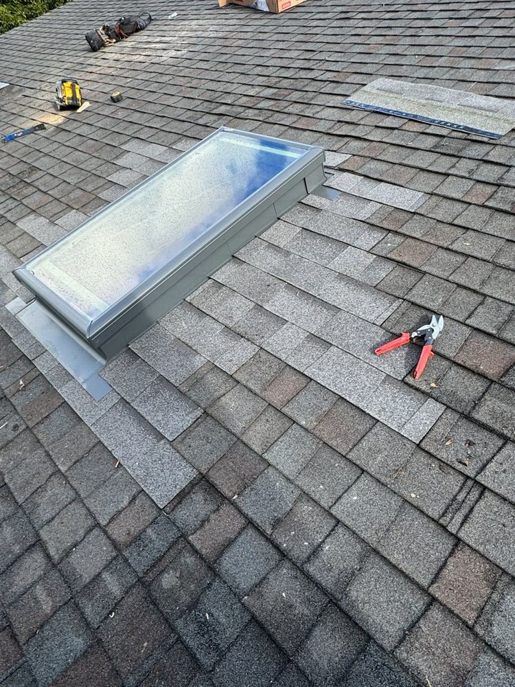 Slide of Maginis Roofing