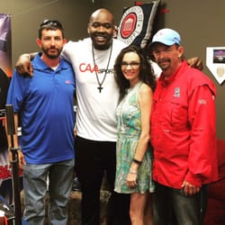 Rebel Rags - Laremy Tunsil, Miami Dolphin & former Ole Miss Offensive Lineman, with owner, Terry Warren, Brandon Warren & Ashley Warren Grantham