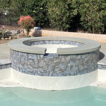 Blue Moon Pools - Flagstone removed from spa and replaced with tile. Cantilevered spa top added. - Pool & Hot Tub Service Near Me - Lakeside, California Blue Moon Pools - Flagstone removed from spa and replaced with tile. Cantilevered spa top added. - Pool & Hot Tub Service Near Me - Lakeside, California