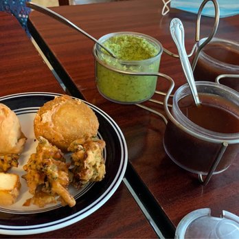 Ambar India - a plate of food on a table - Indian Near Me - Champaign, Illinois Ambar India - a plate of food on a table - Indian Near Me - Champaign, Illinois