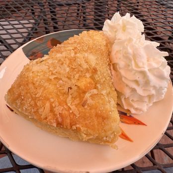 Tea House 650 - Coconut, pineapple, and white chocolate scone with whipped cream - Coffee & Tea Near Me - Crystal River, Florida