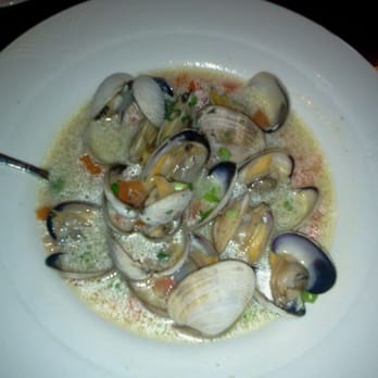 Sevys Bar and Kitchen - Little neck clams in a butter, garlic, and white wine sauce. Served with lemon and toasted bread. Pretty yummy! - Bars Near Me - Aptos, California
