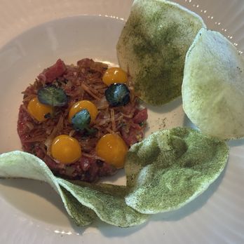 Sky Room - Grass fed steak Tartare with egg yolk jam, pickled mustard and seasoned chips. - American Near Me - Long Beach, California Sky Room - Grass fed steak Tartare with egg yolk jam, pickled mustard and seasoned chips. - American Near Me - Long Beach, California