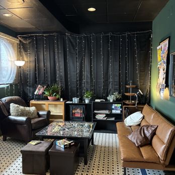 KAYSI CAKES - a living room with black walls and a black ceiling - Desserts Near Me - DuBois, Pennsylvania