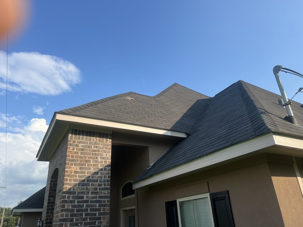 Slide of All In One Exterior & Construction