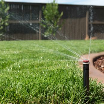 Steve FitzPatrick - a sprinkler spraying water on a lawn - Irrigation Near Me Steve FitzPatrick - a sprinkler spraying water on a lawn - Irrigation Near Me