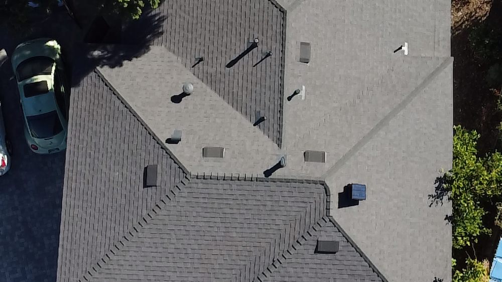 Slide of Golden Team Roofing